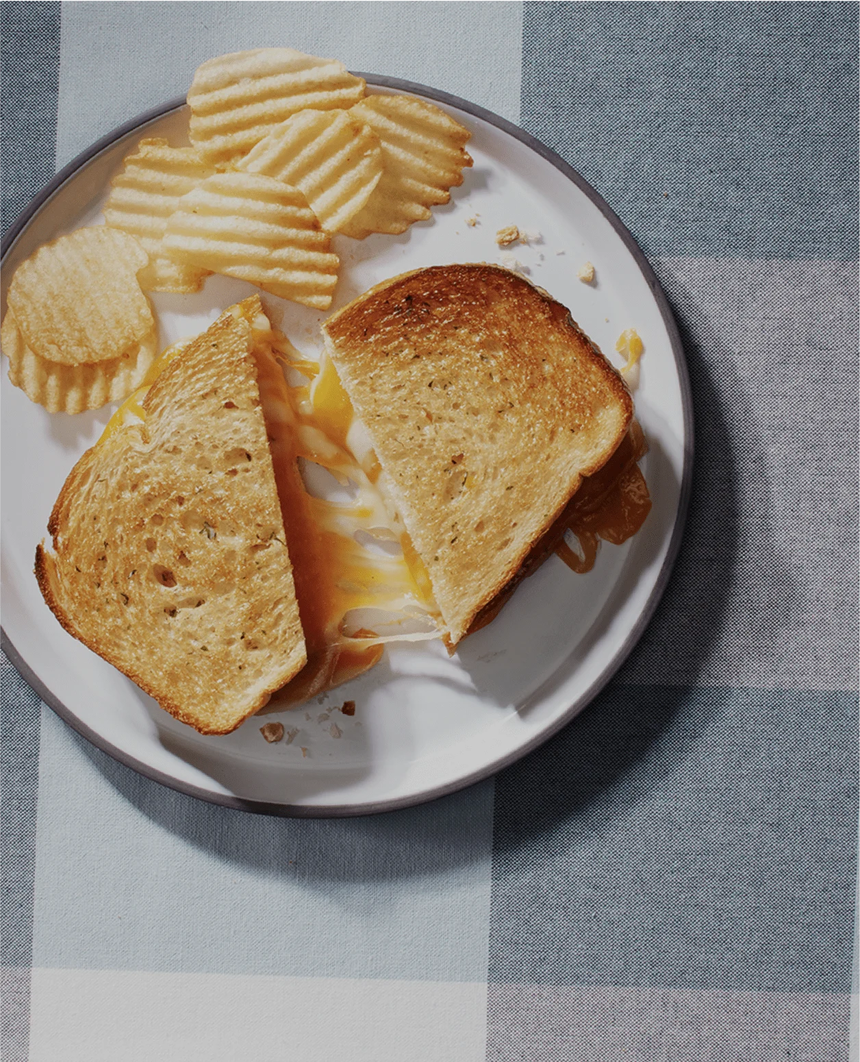 grilled cheese sandwich with potato chips